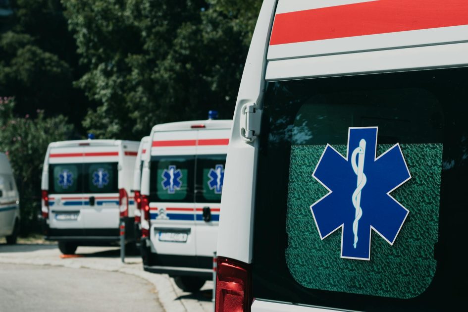 Ambulance Toyota Voxy: Panduan Lengkap 2024 + 7 Keunggulan 1 Three ambulances parked outdoors, ready for emergency healthcare situations.