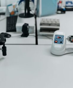 A well-equipped laboratory with a microscope and vials ready for analysis.