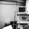 Black and white photo of a Fabius anesthesia workstation in a hospital environment.