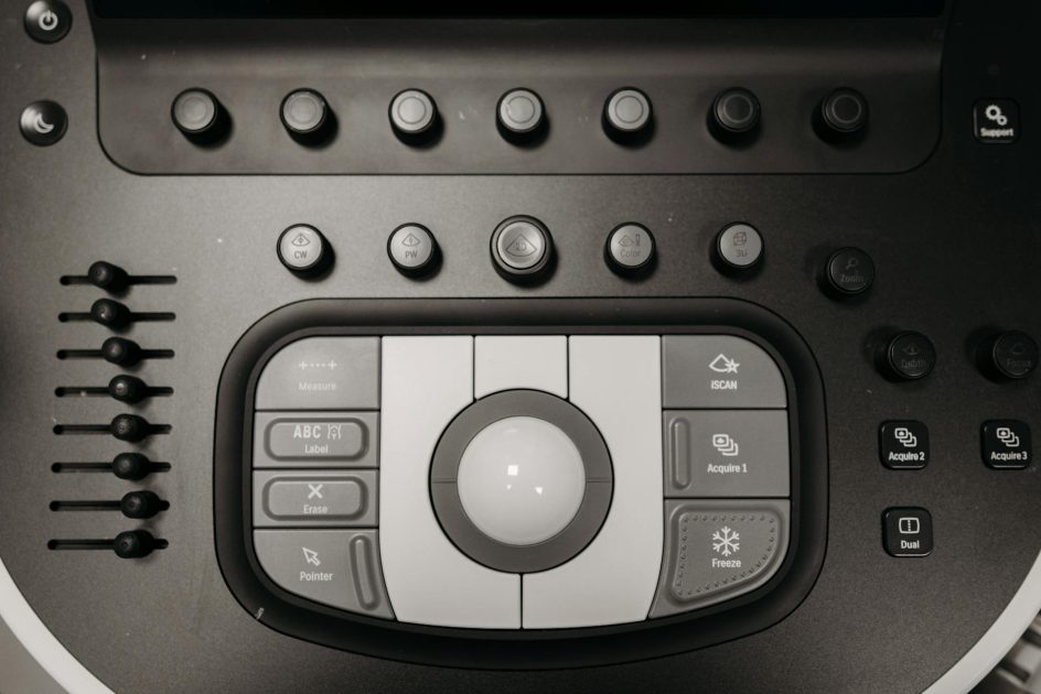 GE LOGIQ P9 XDclear Ultrasound - Pavel Danilyuk Detailed view of buttons and controls on a medical ultrasound machine for diagnostics.