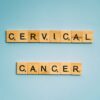 SERENITY IVA Kit VK-01 | Alat Deteksi Kanker Serviks #1 2 Scrabble tiles spelling 'Cervical Cancer' on a light blue background for awareness.