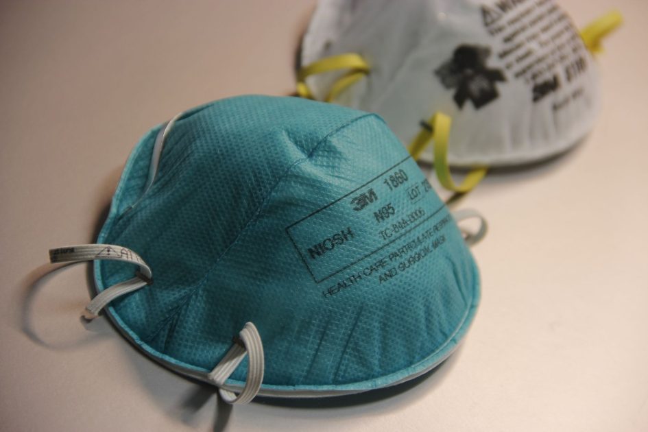 Detailed close-up of N95 face masks, essential for healthcare protection against airborne particles.