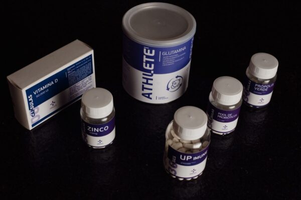 Close-up of a variety of nutritional supplements, vitamins, and probiotics.