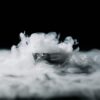 Falling Film Evaporator – Alat Evaporasi Efisien untuk Laboratorium 1 Abstract image of smoke wafting over an ice cube against a black background, creating a mysterious atmosphere.