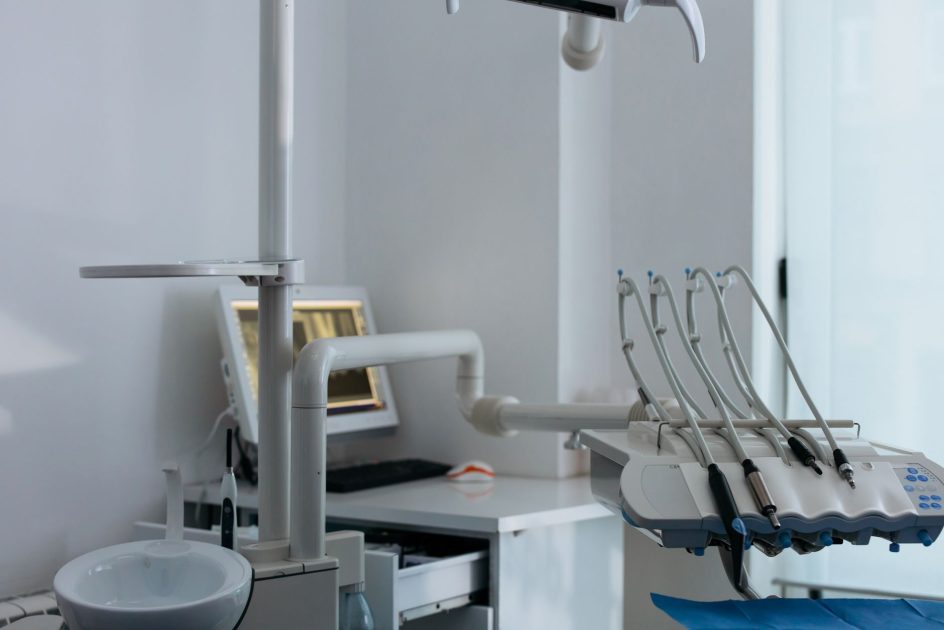Mayapada Dental Care Hadir Jaktim: 7 Layanan Gigi Terintegrasi 1 Close-up of advanced dental chair setup with dental instruments in a clinic.